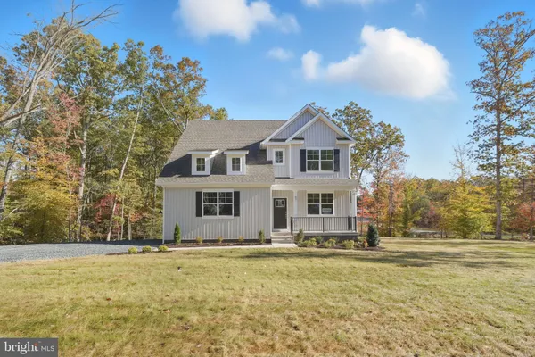 a front view of house with yard
