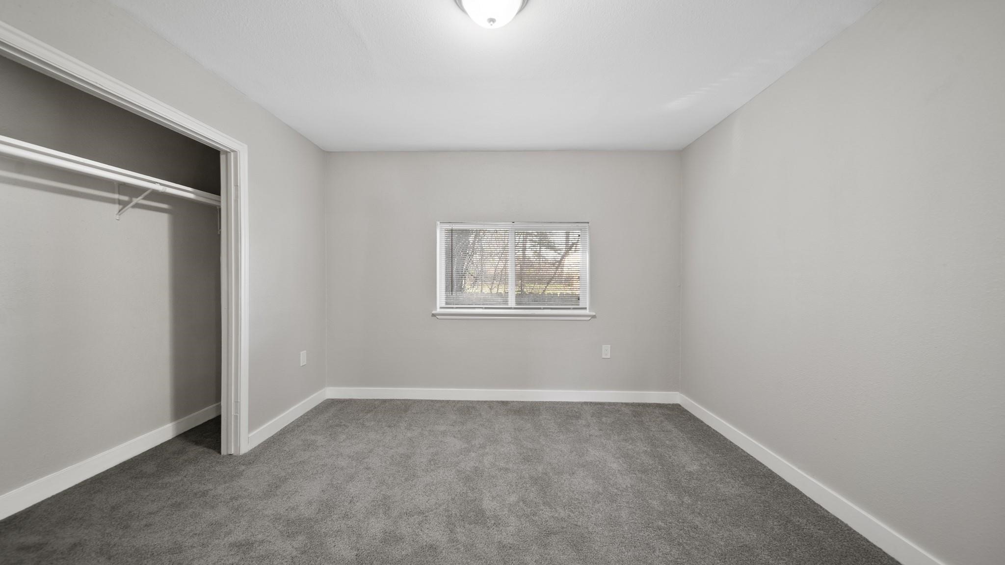 7810 Glass Street Houston, TX 77016 - Photo 9 of 12 a view of an empty room with a window