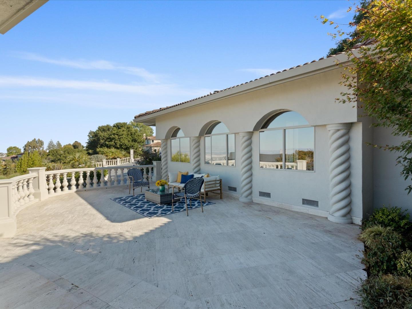 1 Lewis Ranch Road San Carlos, CA 94070 - Photo 14 of 94 a view of a terrace with chairs and potted plants