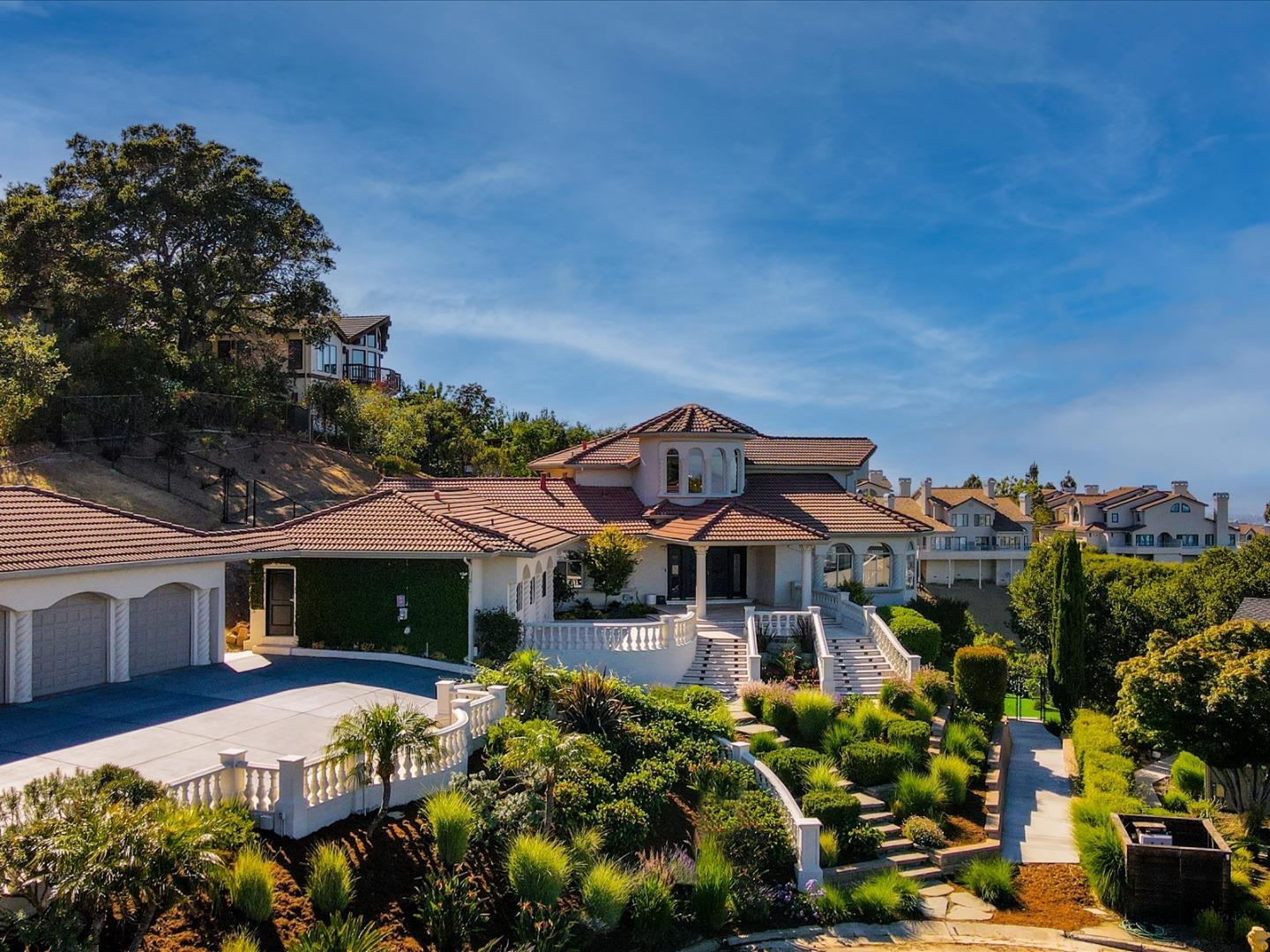 1 Lewis Ranch Road San Carlos, CA 94070 - Photo 2 of 94 a front view of a house with a yard