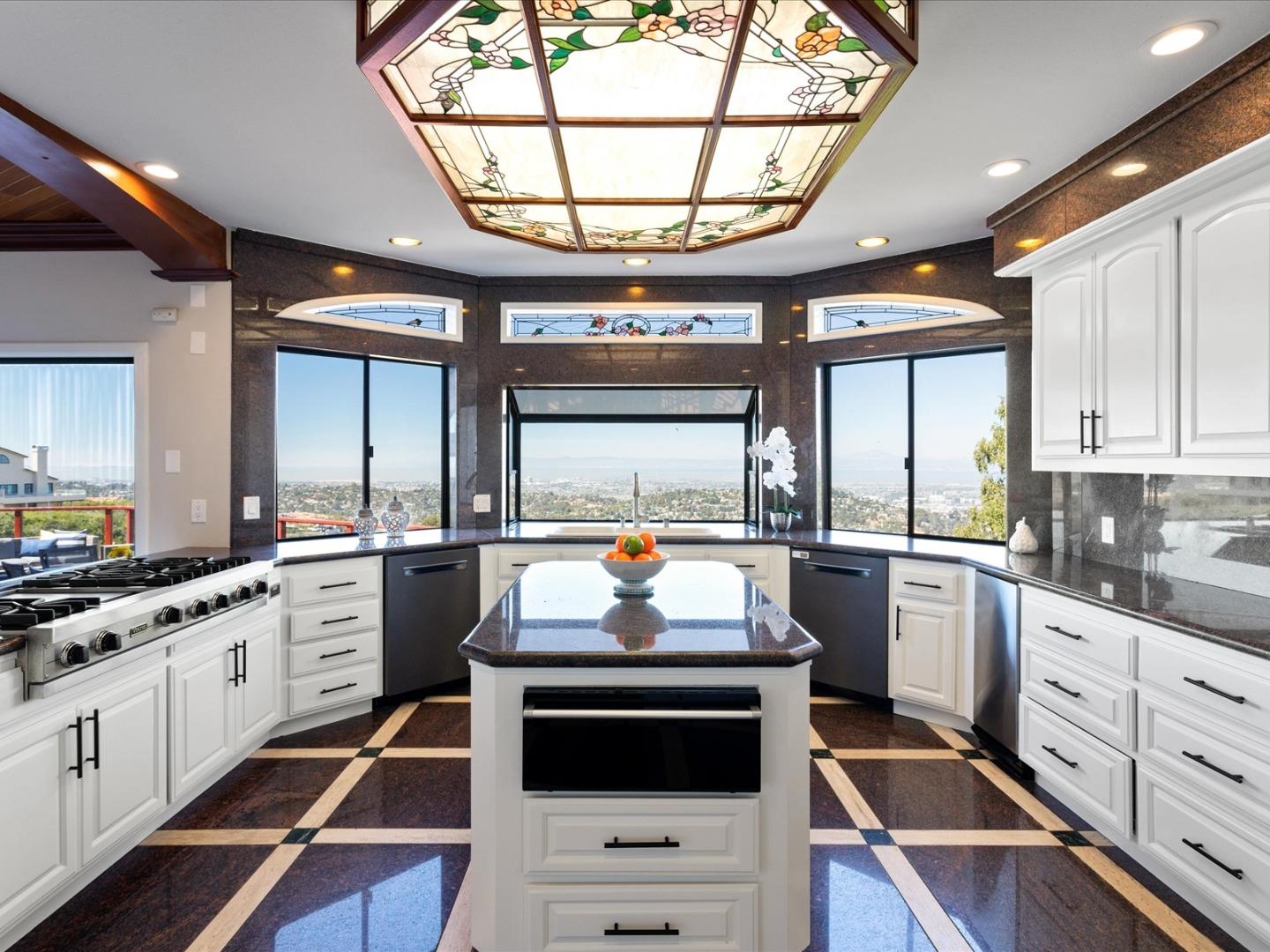 1 Lewis Ranch Road San Carlos, CA 94070 - Photo 25 of 94 a kitchen with stainless steel appliances a stove a sink and a cabinets