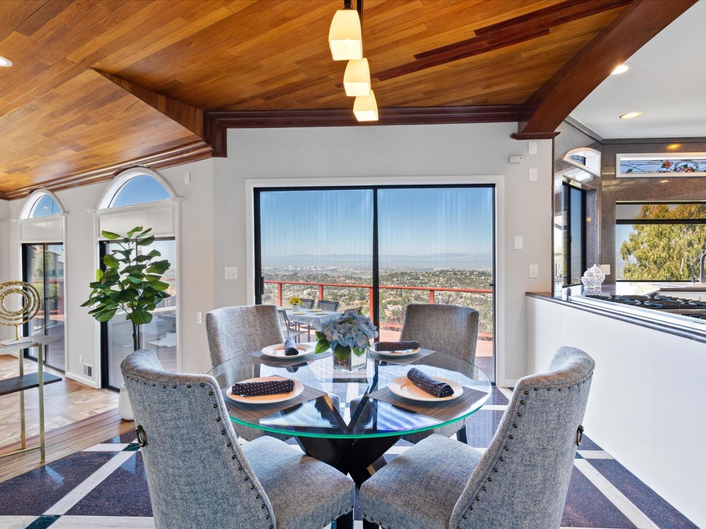 1 Lewis Ranch Road San Carlos, CA 94070 - Photo 33 of 94 a view of a dining room with furniture window and wooden floor
