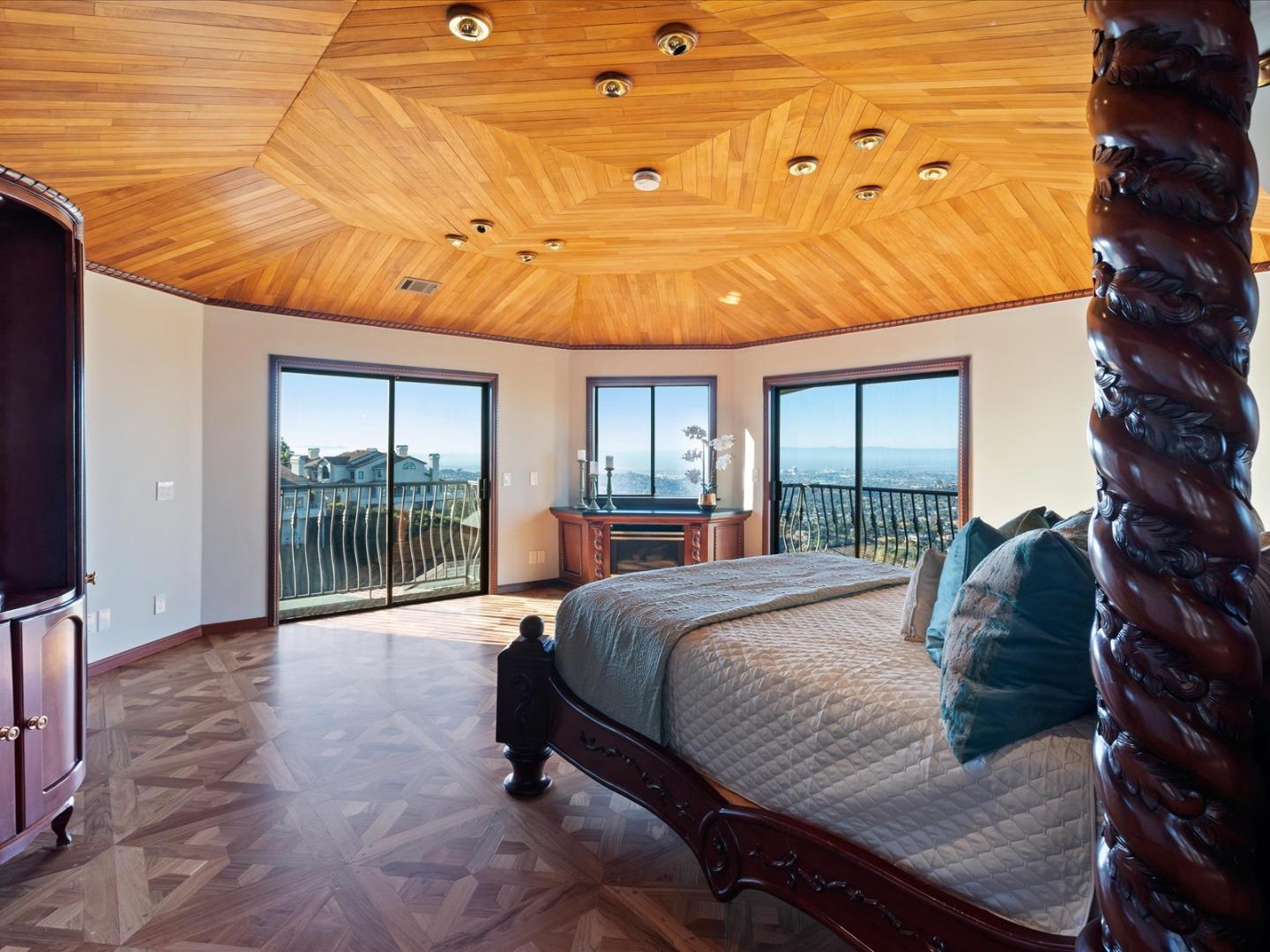 1 Lewis Ranch Road San Carlos, CA 94070 - Photo 57 of 94 a bed sitting in a bedroom next to a window