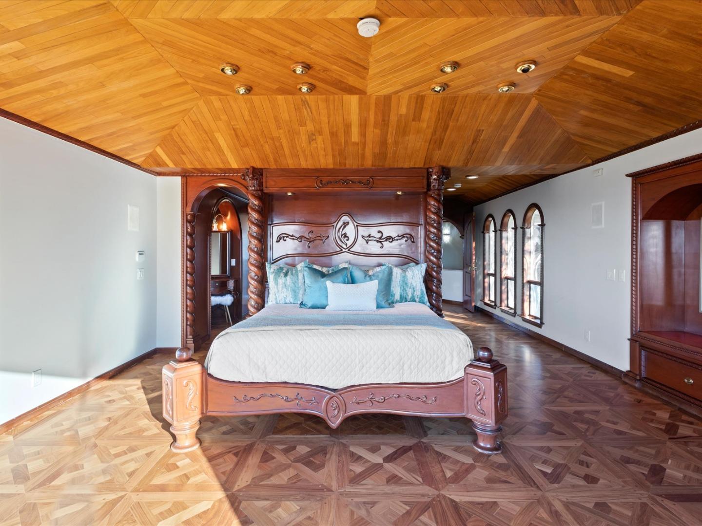 1 Lewis Ranch Road San Carlos, CA 94070 - Photo 58 of 94 a bed sitting in a spacious bedroom next to a larger window