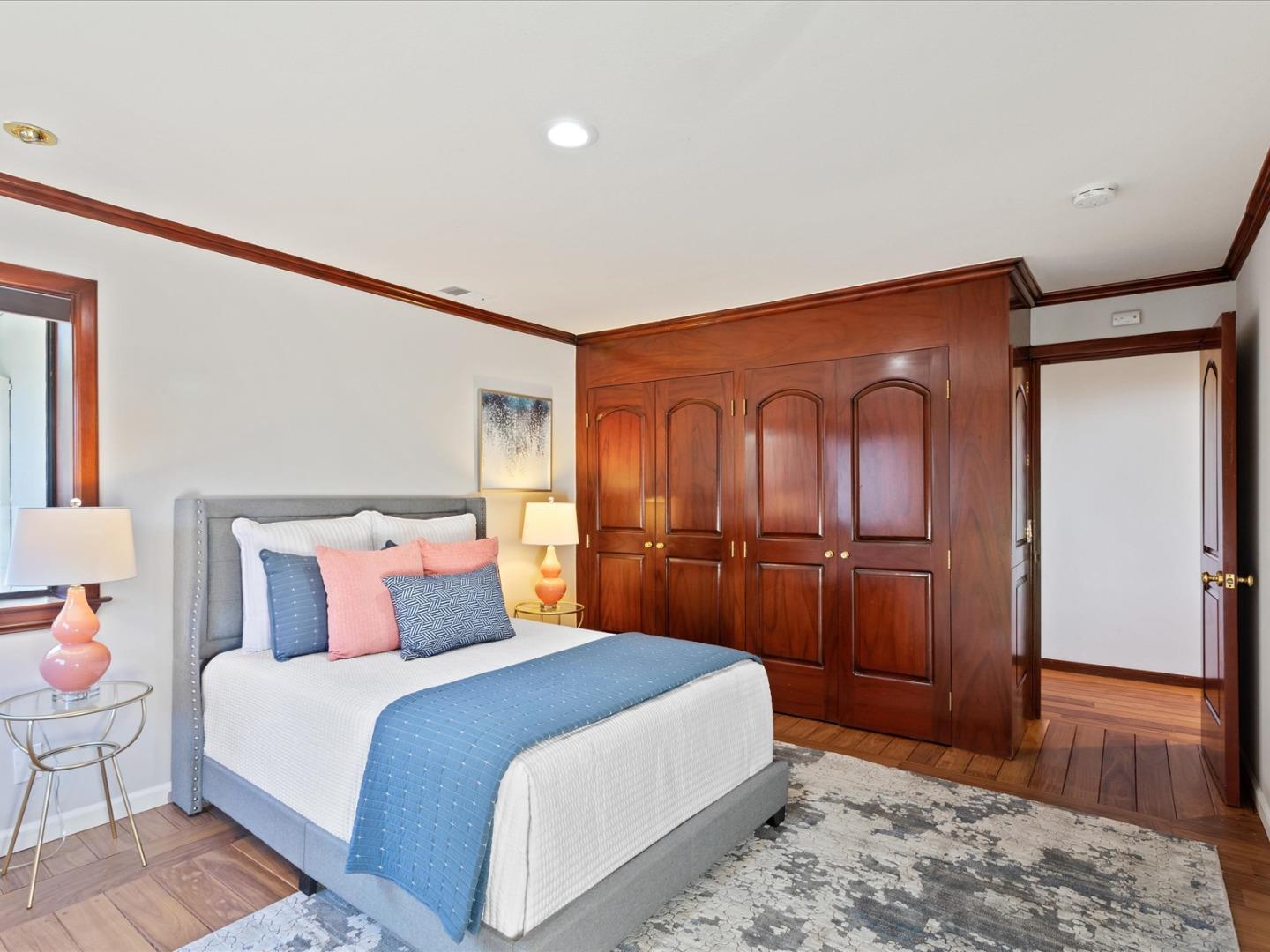 1 Lewis Ranch Road San Carlos, CA 94070 - Photo 65 of 94 a bedroom with a bed and wooden floor