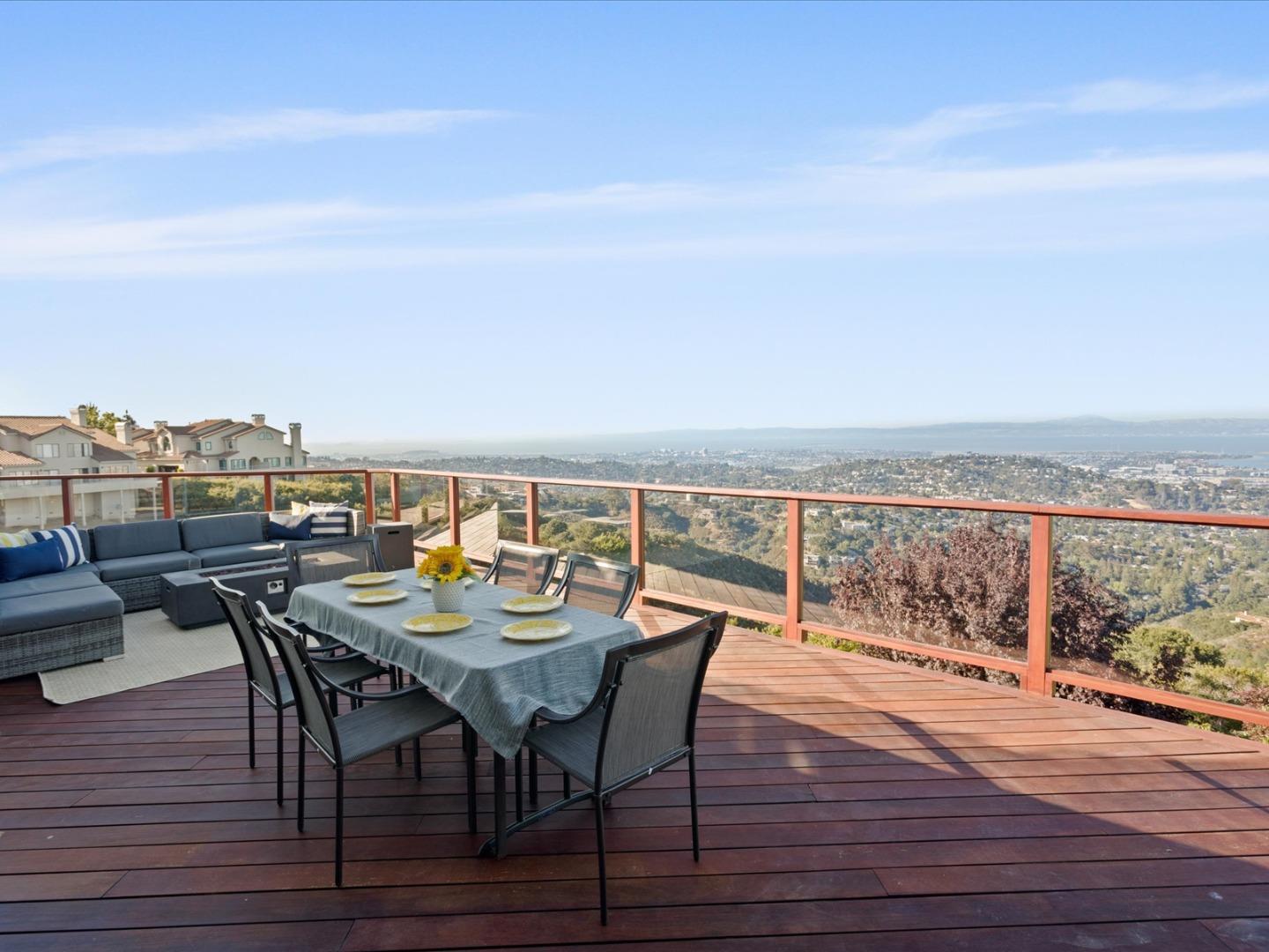 1 Lewis Ranch Road San Carlos, CA 94070 - Photo 76 of 94 a view of a terrace with wooden floor and city view