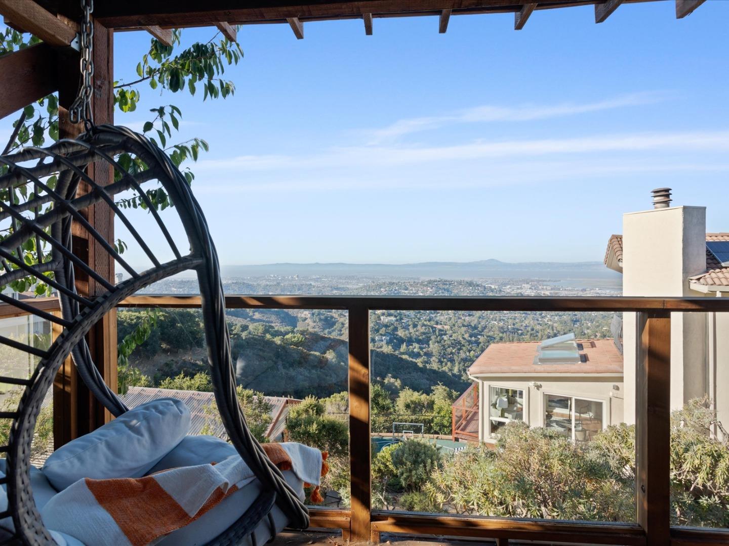 1 Lewis Ranch Road San Carlos, CA 94070 - Photo 86 of 94 a view of a chairs and table in a balcony