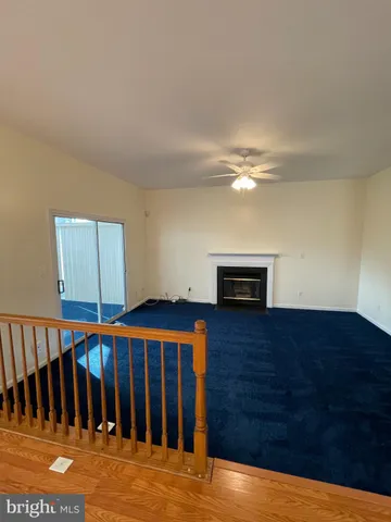 a kitchen with a sink stove top oven and microwave