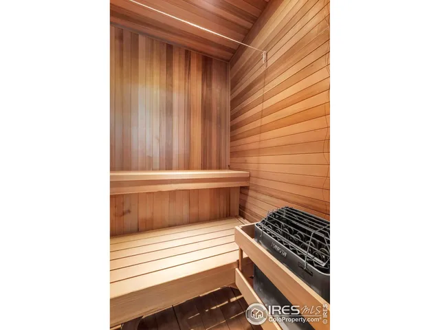 a view of room with wooden floor