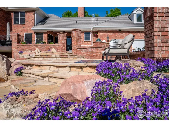 a front view of a house with yard