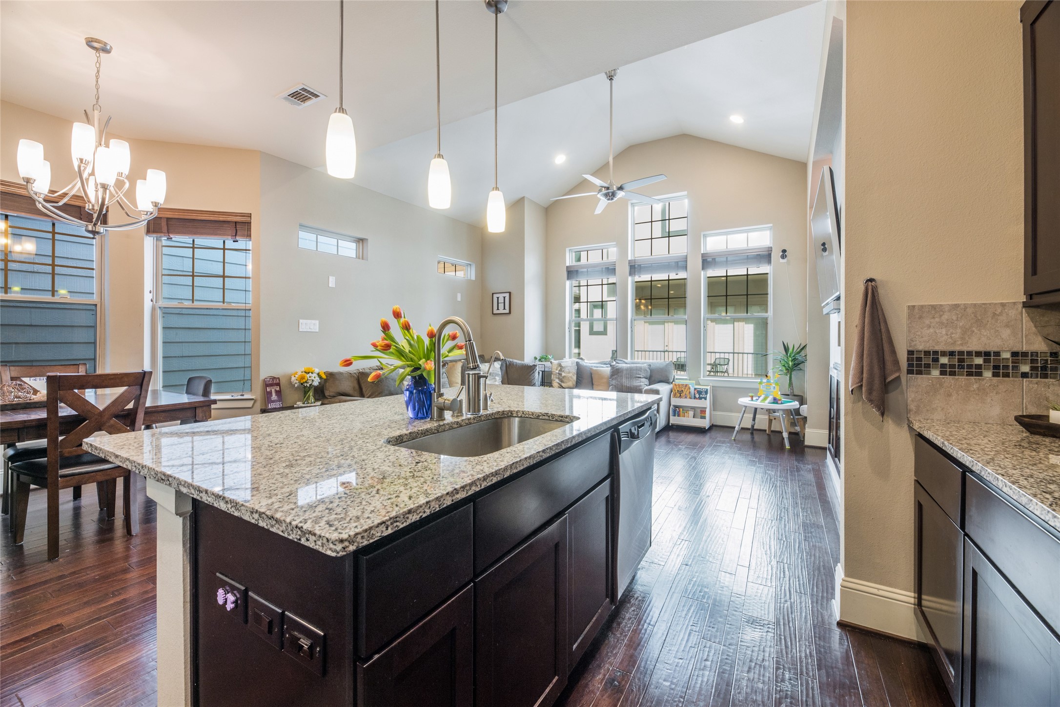 769 Waverly Street Houston, TX 77007 - Photo 14 of 35 a kitchen with sink stove and wooden floor