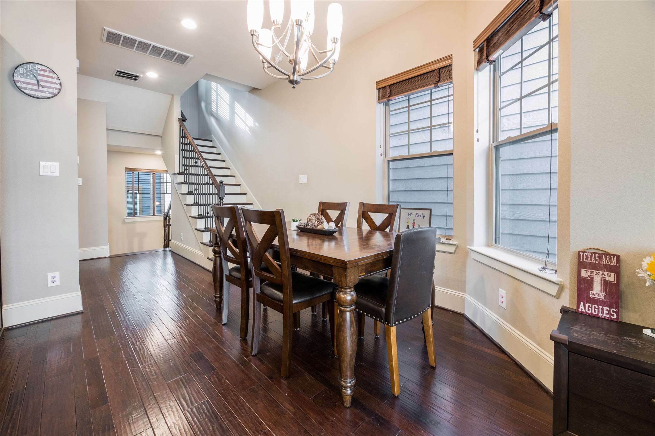 769 Waverly Street Houston, TX 77007 - Photo 15 of 35 a view of a dining room with furniture window and wooden floor