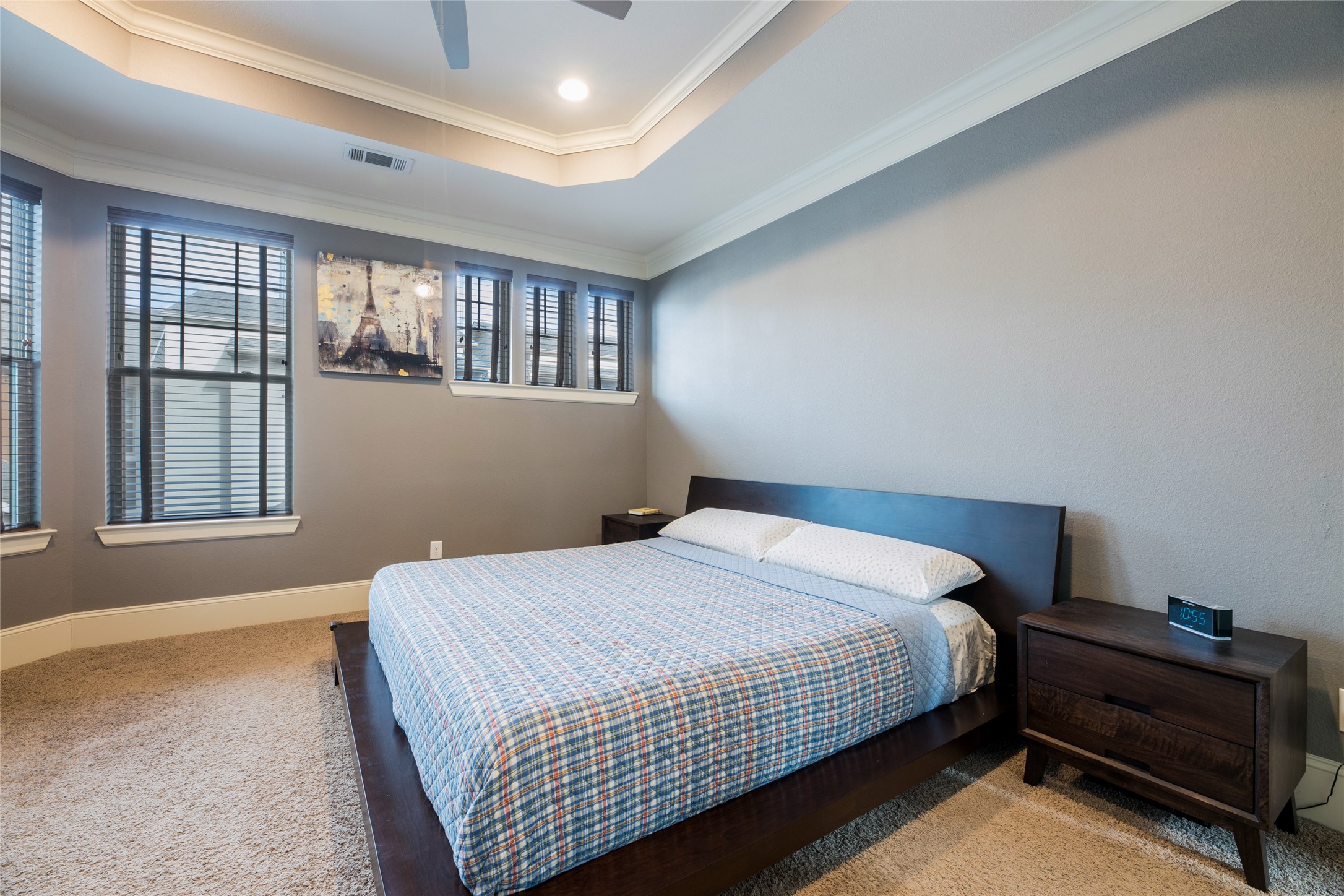 769 Waverly Street Houston, TX 77007 - Photo 20 of 35 a bedroom with a bed and windows