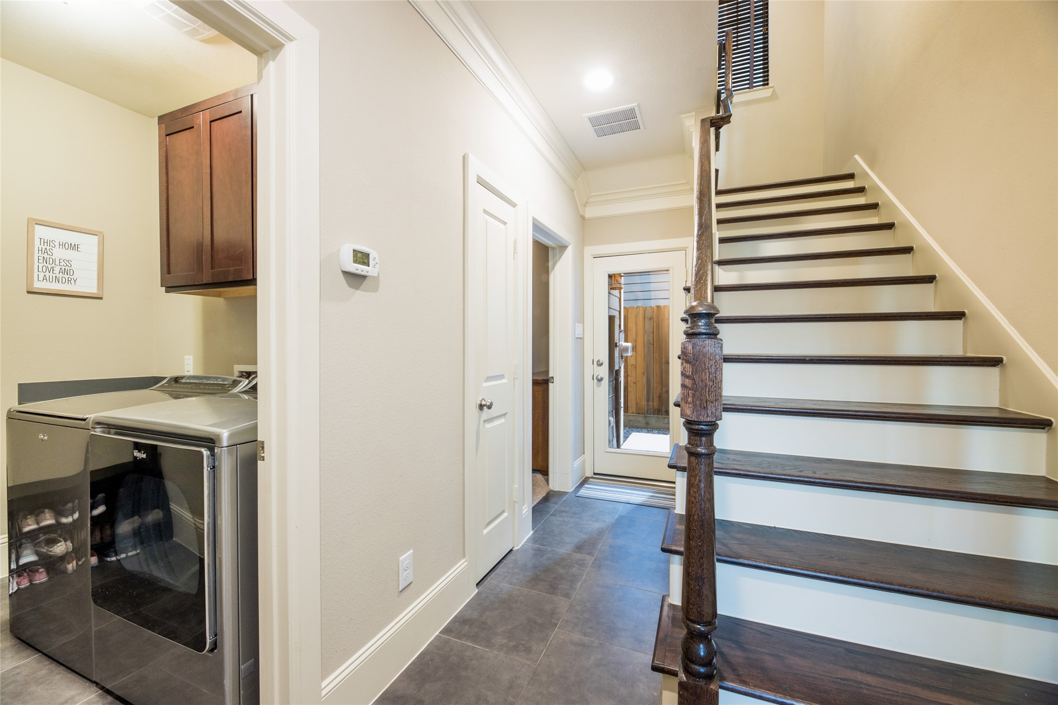 769 Waverly Street Houston, TX 77007 - Photo 3 of 35 a view of entryway and hall with wooden floor