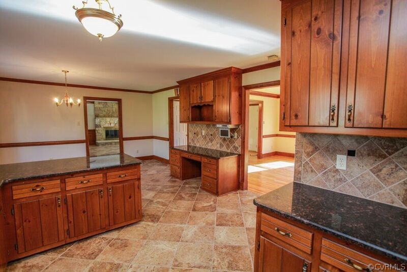 12907 Rivers Bend Road Chester, VA 23836 - Photo 11 of 43 Peninsula and desk area.