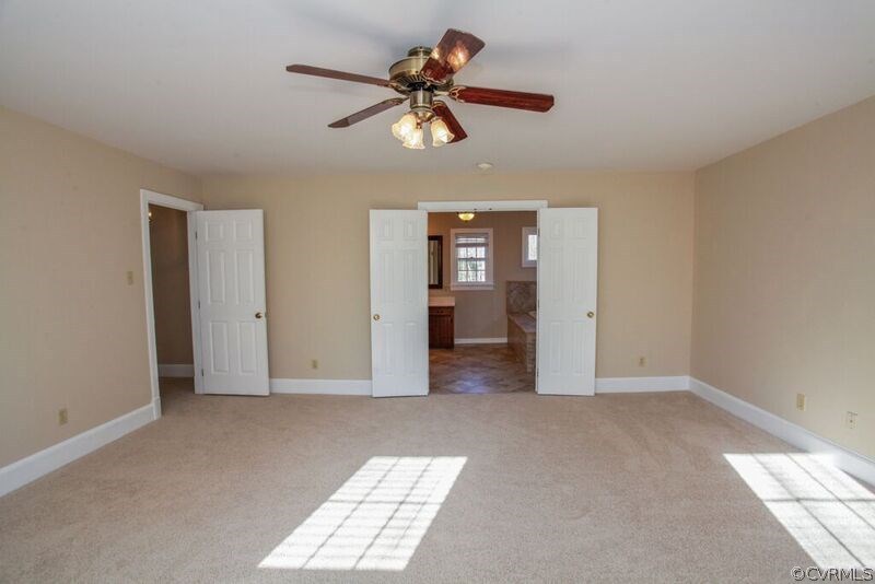 12907 Rivers Bend Road Chester, VA 23836 - Photo 18 of 43 Master Bedroom with new paint and carpet, plus cei
