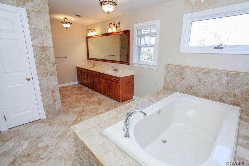 12907 Rivers Bend Road Chester, VA 23836 - Photo 20 of 43 Renovated Master Bathroom features dual vanities,