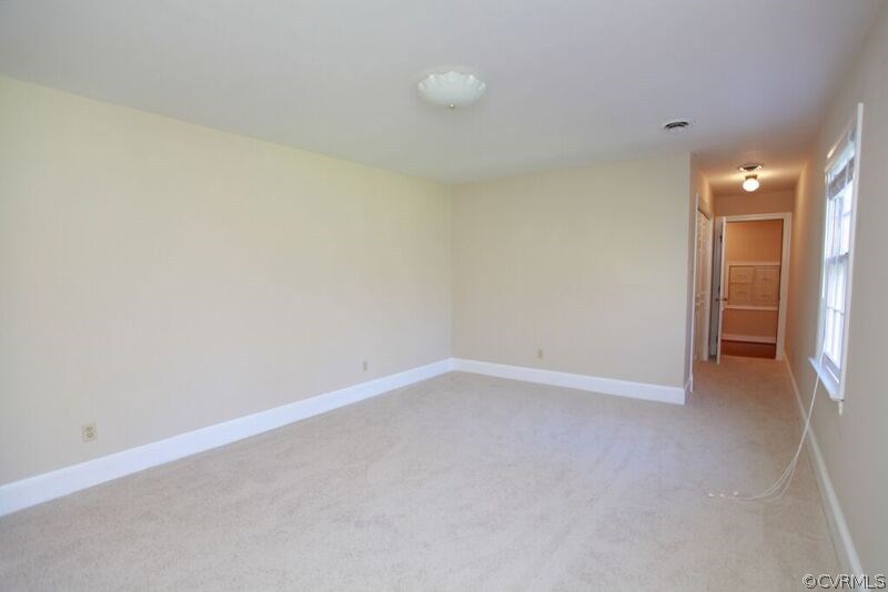 12907 Rivers Bend Road Chester, VA 23836 - Photo 27 of 43 Bedroom #3 with new paint and carpet, walk-in clos
