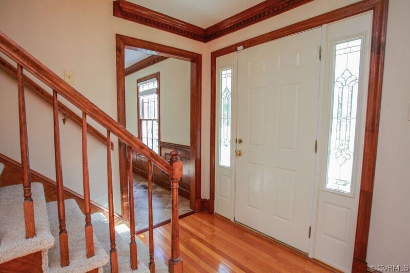 12907 Rivers Bend Road Chester, VA 23836 - Photo 4 of 43 Foyer features crown molding and hardwood flooring
