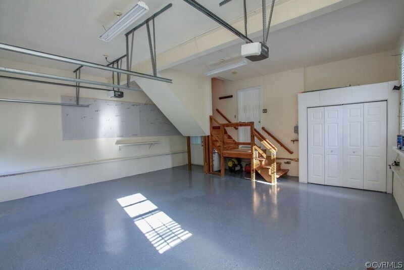 12907 Rivers Bend Road Chester, VA 23836 - Photo 41 of 43 Interior photo of garage with newly painted floor,