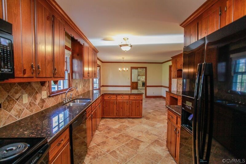 12907 Rivers Bend Road Chester, VA 23836 - Photo 8 of 43 Alternate view of Kitchen from garage entrance.