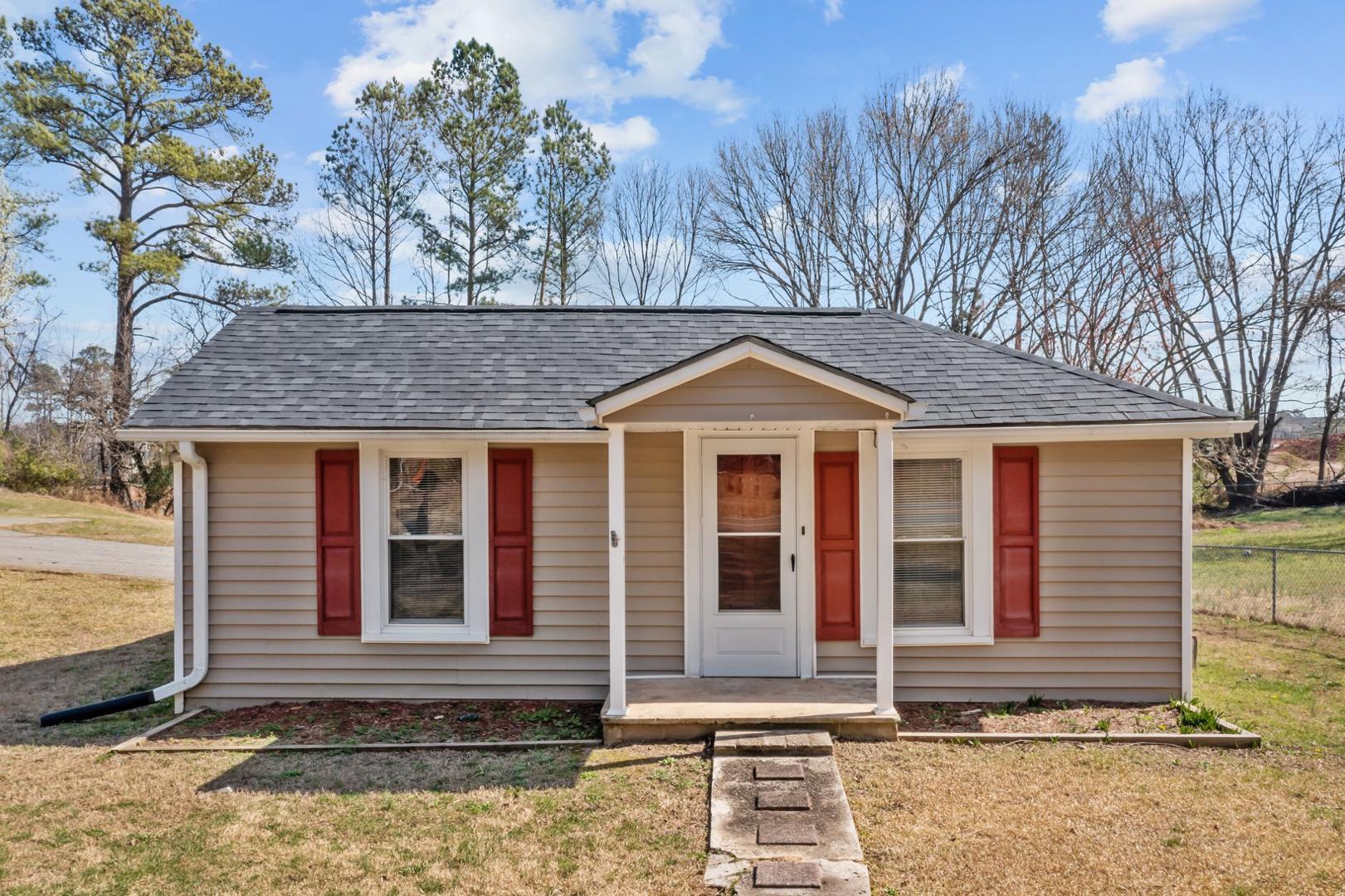 2005 Doc Nichols Road Durham, NC 27703 - Photo 2 of 37 a front view of a house with a yard