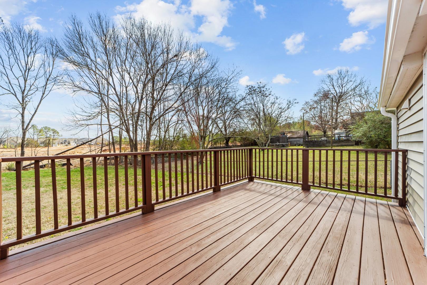 2005 Doc Nichols Road Durham, NC 27703 - Photo 22 of 37 a view of a wooden deck