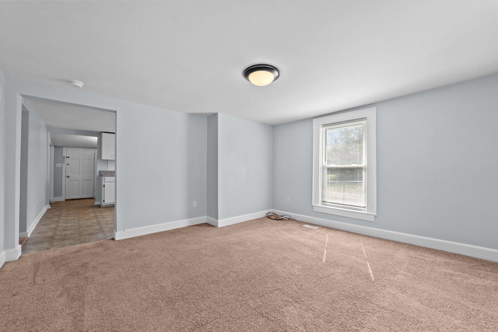 2005 Doc Nichols Road Durham, NC 27703 - Photo 23 of 37 an empty room with windows
