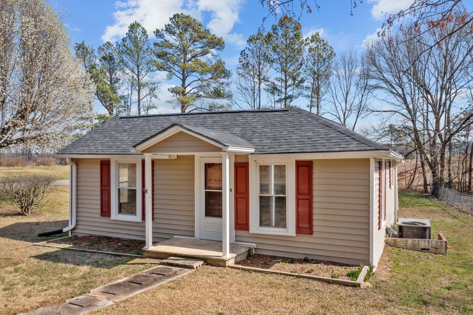 2005 Doc Nichols Road Durham, NC 27703 - Photo 3 of 37 a front view of a house with a yard