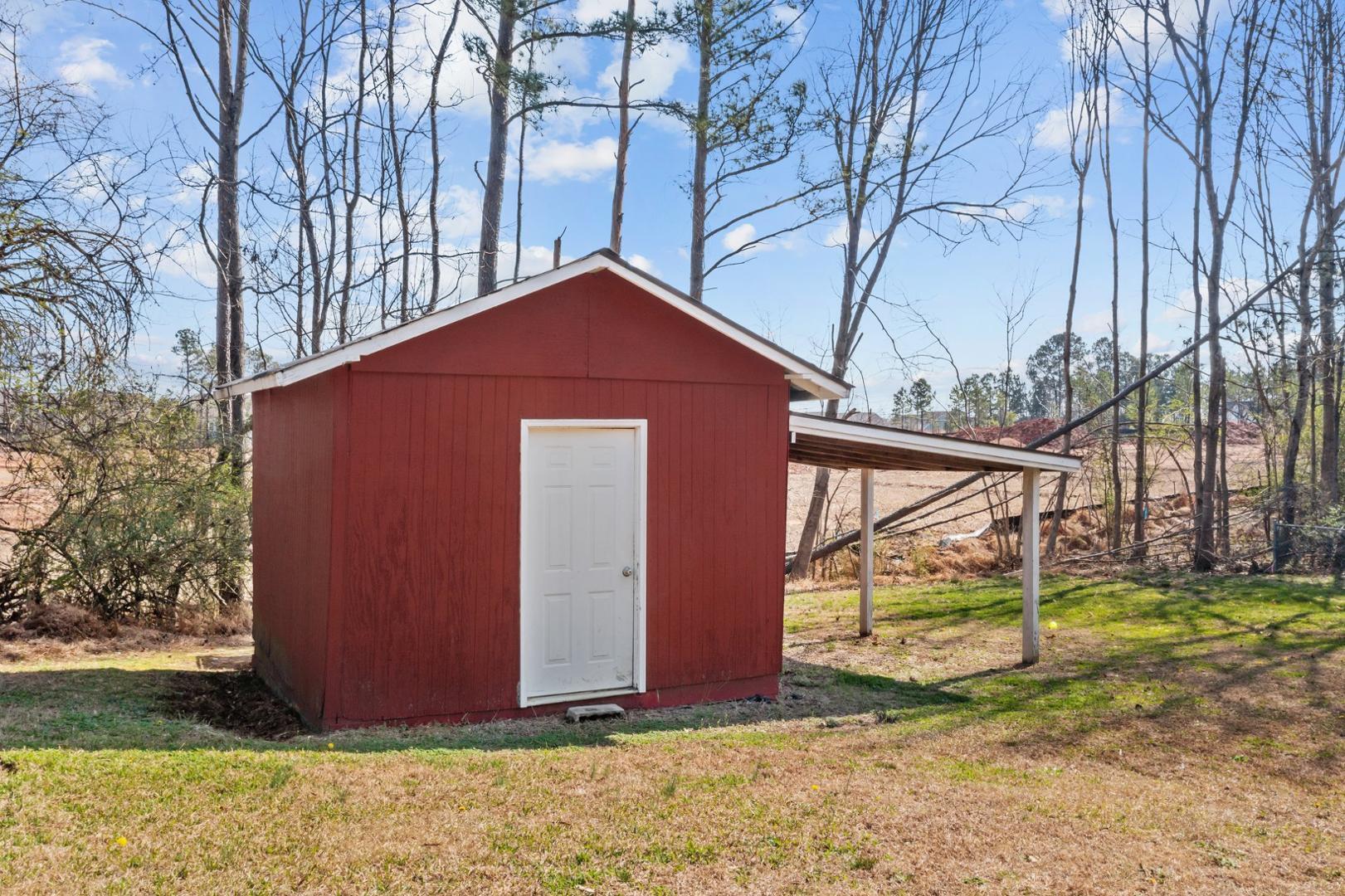 2005 Doc Nichols Road Durham, NC 27703 - Photo 6 of 37 a front view of a house with garden