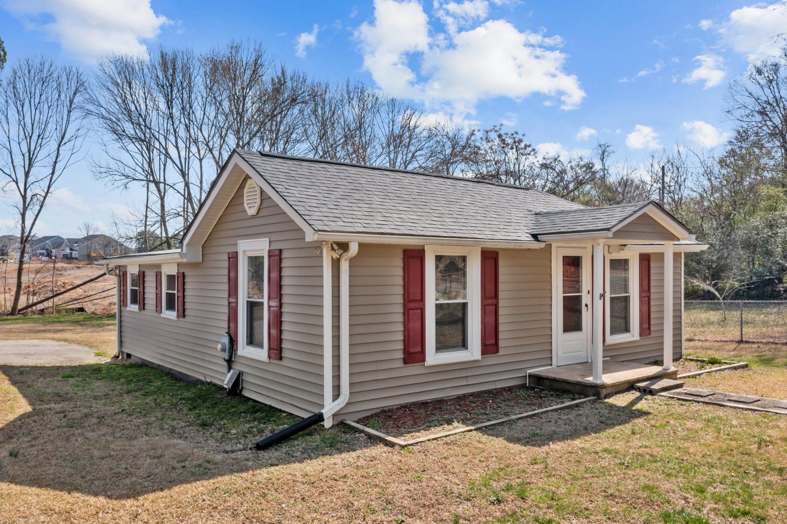 2005 Doc Nichols Road Durham, NC 27703 - Photo 7 of 37 a view of a house with a yard