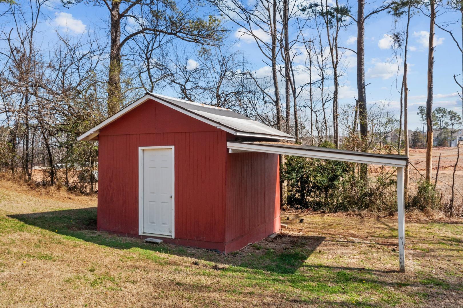 2005 Doc Nichols Road Durham, NC 27703 - Photo 8 of 37 a front view of a house with garden