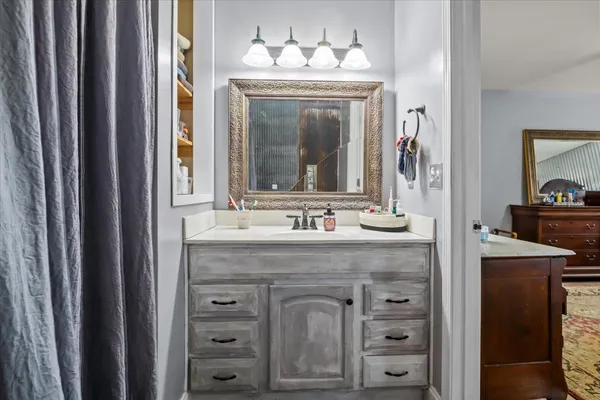 a view of a sink and a mirror
