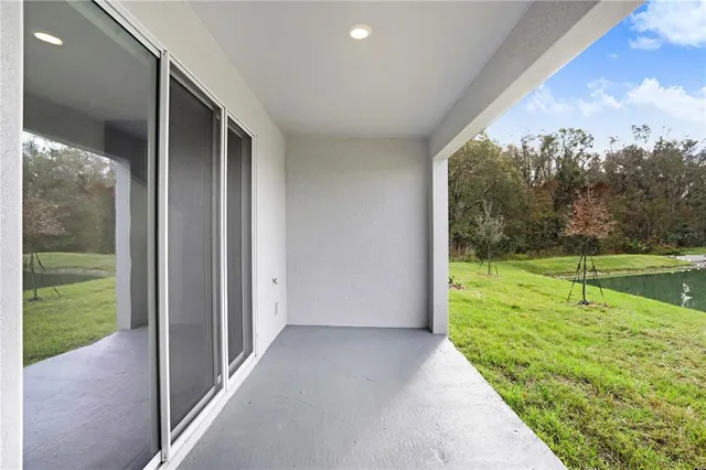 a view of swimming pool with a yard