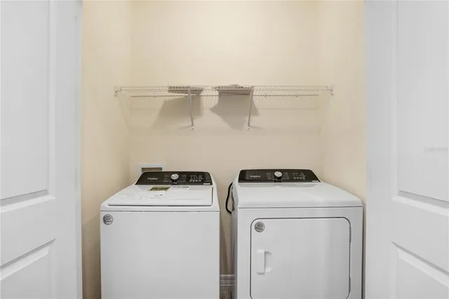 a utility room with dryer and washer