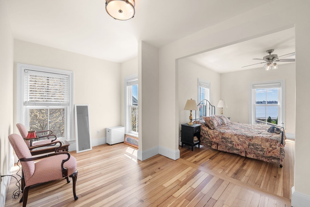 90 Puritan Road Swampscott, MA 01907 - Photo 23 of 42 a living room with furniture and a wooden floor