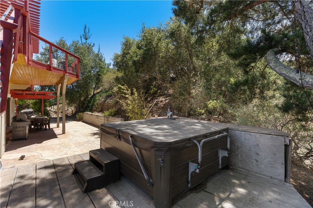 1010-1012 Upper Los Berros Road Nipomo, CA 93444 - Photo 42 of 75 a view of a patio with table and chairs with wooden fence and plants