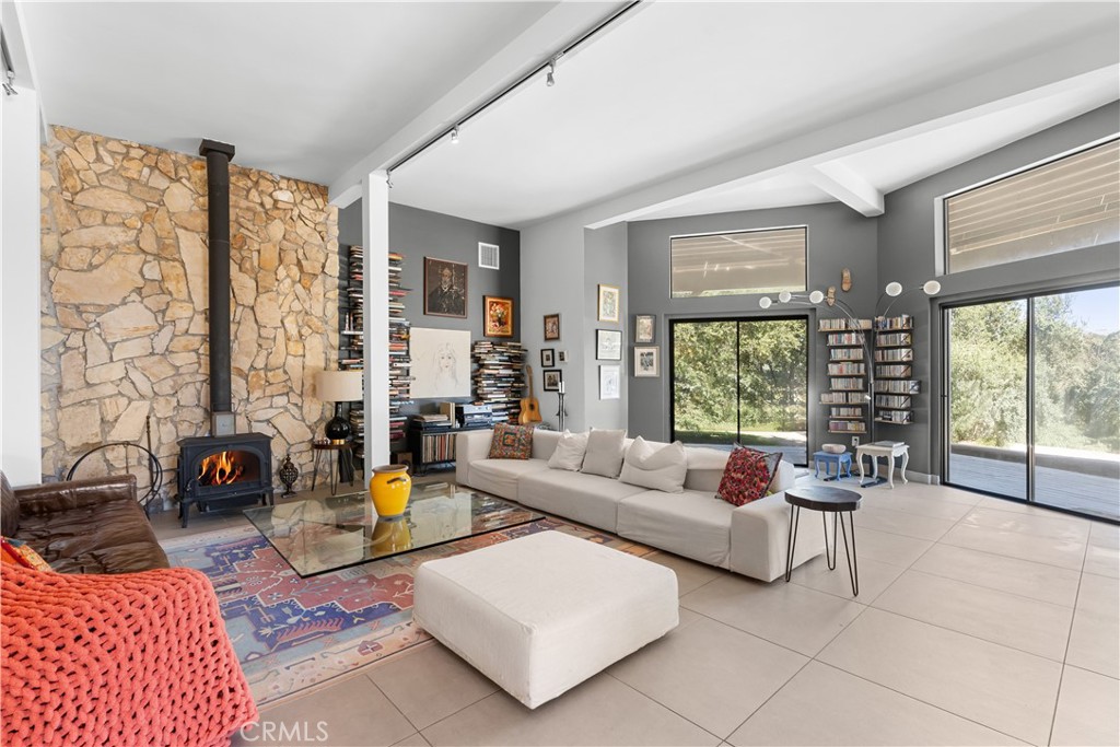 1010-1012 Upper Los Berros Road Nipomo, CA 93444 - Photo 5 of 75 a living room with fireplace furniture and floor to ceiling window