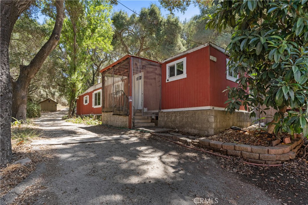 1010-1012 Upper Los Berros Road Nipomo, CA 93444 - Photo 55 of 75 a backyard of a house with lots of green space