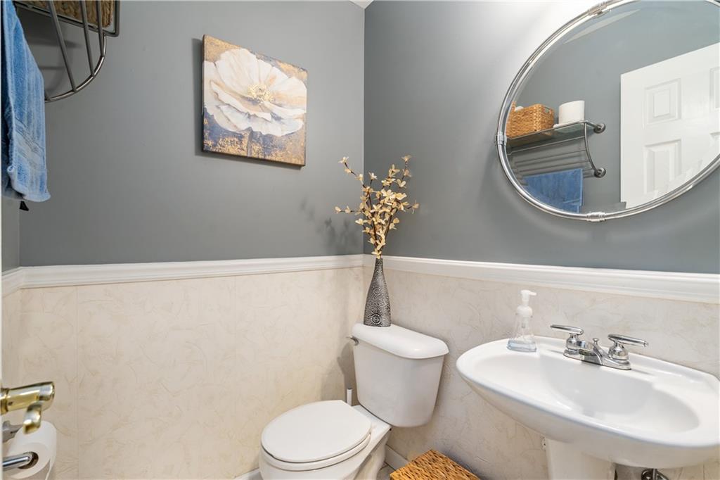122 Terra Drive McKees Rocks, PA 15136 - Photo 15 of 28 a bathroom with a sink mirror and toilet