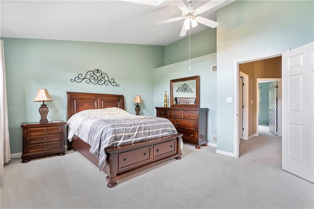 122 Terra Drive McKees Rocks, PA 15136 - Photo 18 of 28 a spacious bedroom with a bed and cabinets