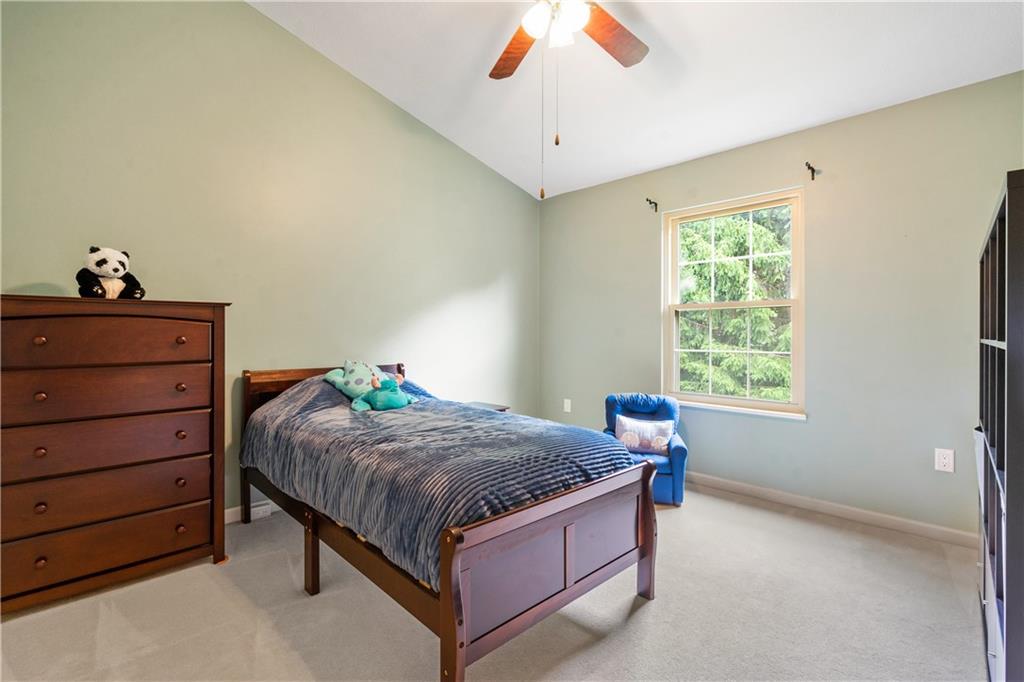 122 Terra Drive McKees Rocks, PA 15136 - Photo 21 of 28 a bed room with a bed and a window