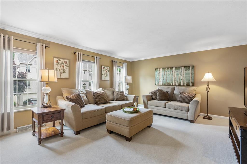 122 Terra Drive McKees Rocks, PA 15136 - Photo 3 of 28 a living room with furniture and a large window