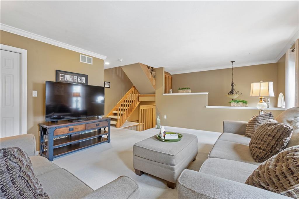 122 Terra Drive McKees Rocks, PA 15136 - Photo 5 of 28 a living room with furniture and a flat screen tv