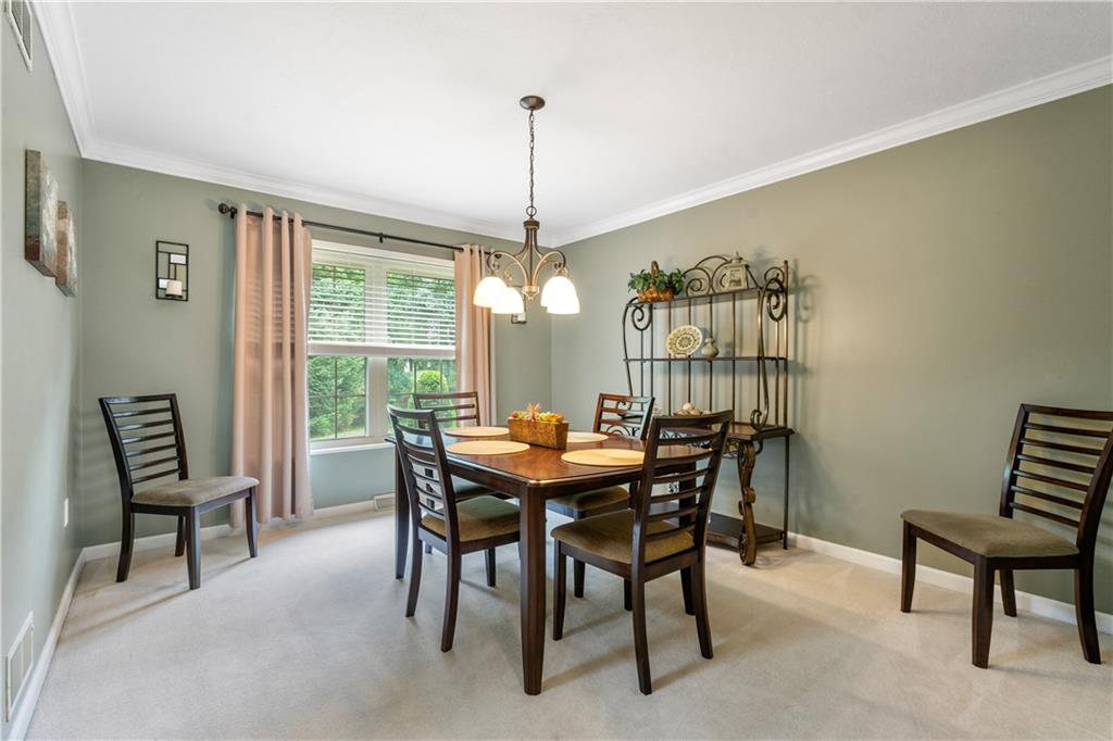 122 Terra Drive McKees Rocks, PA 15136 - Photo 6 of 28 a view of a dining room with furniture window and outside view