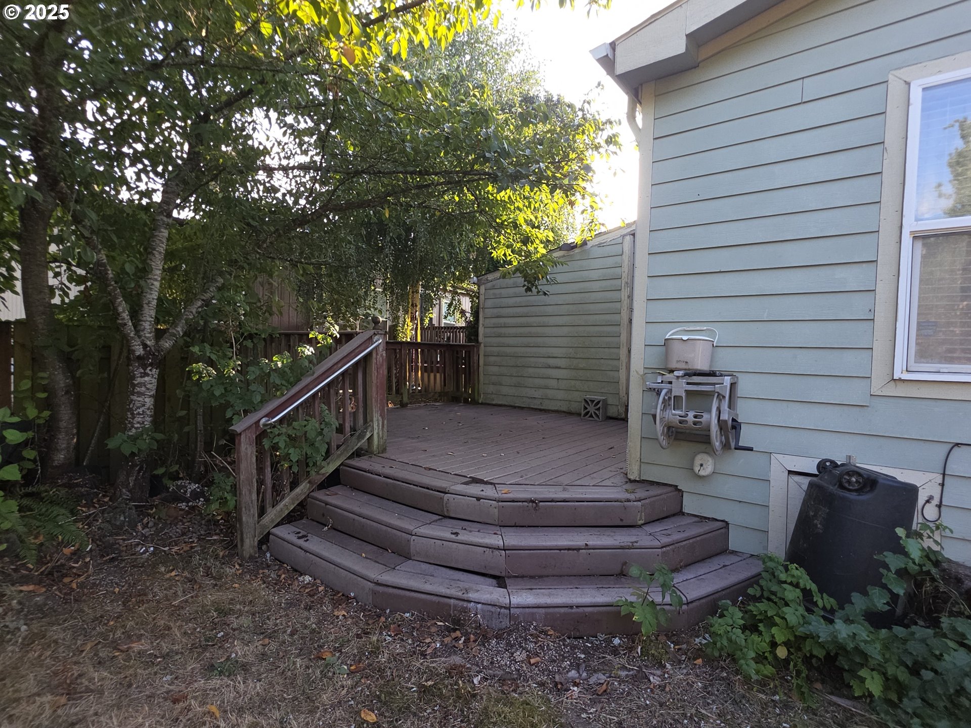 4808 Southeast 134th Drive Portland, OR 97236 - Photo 5 of 15 a view of a house with a yard