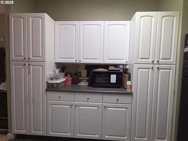 a very nice looking living room with dining room and furniture