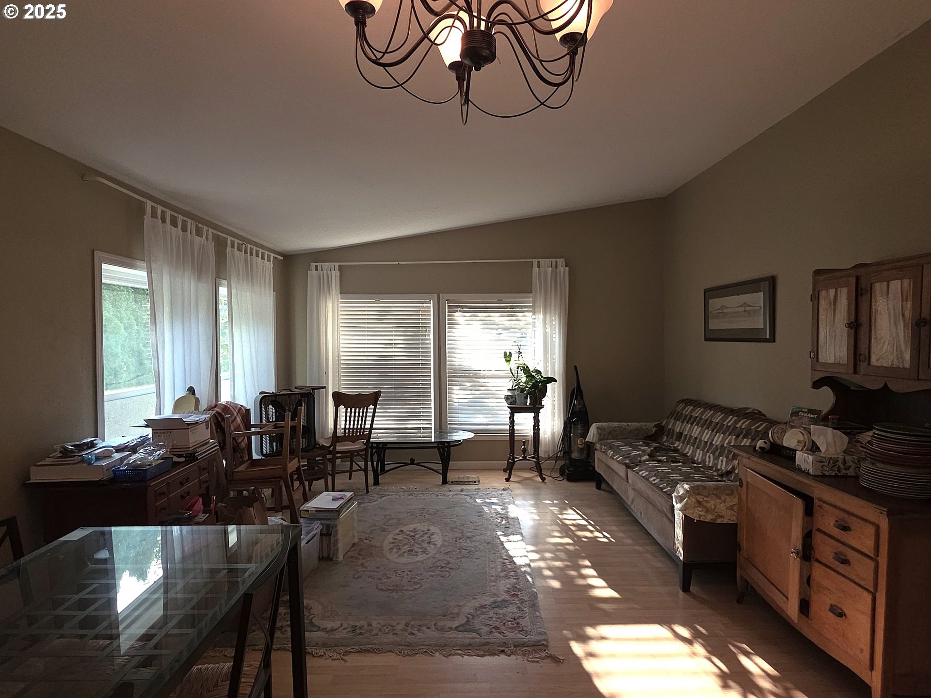 4808 Southeast 134th Drive Portland, OR 97236 - Photo 10 of 15 a very nice looking living room with dining room and furniture