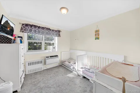 a view of an empty room with windows