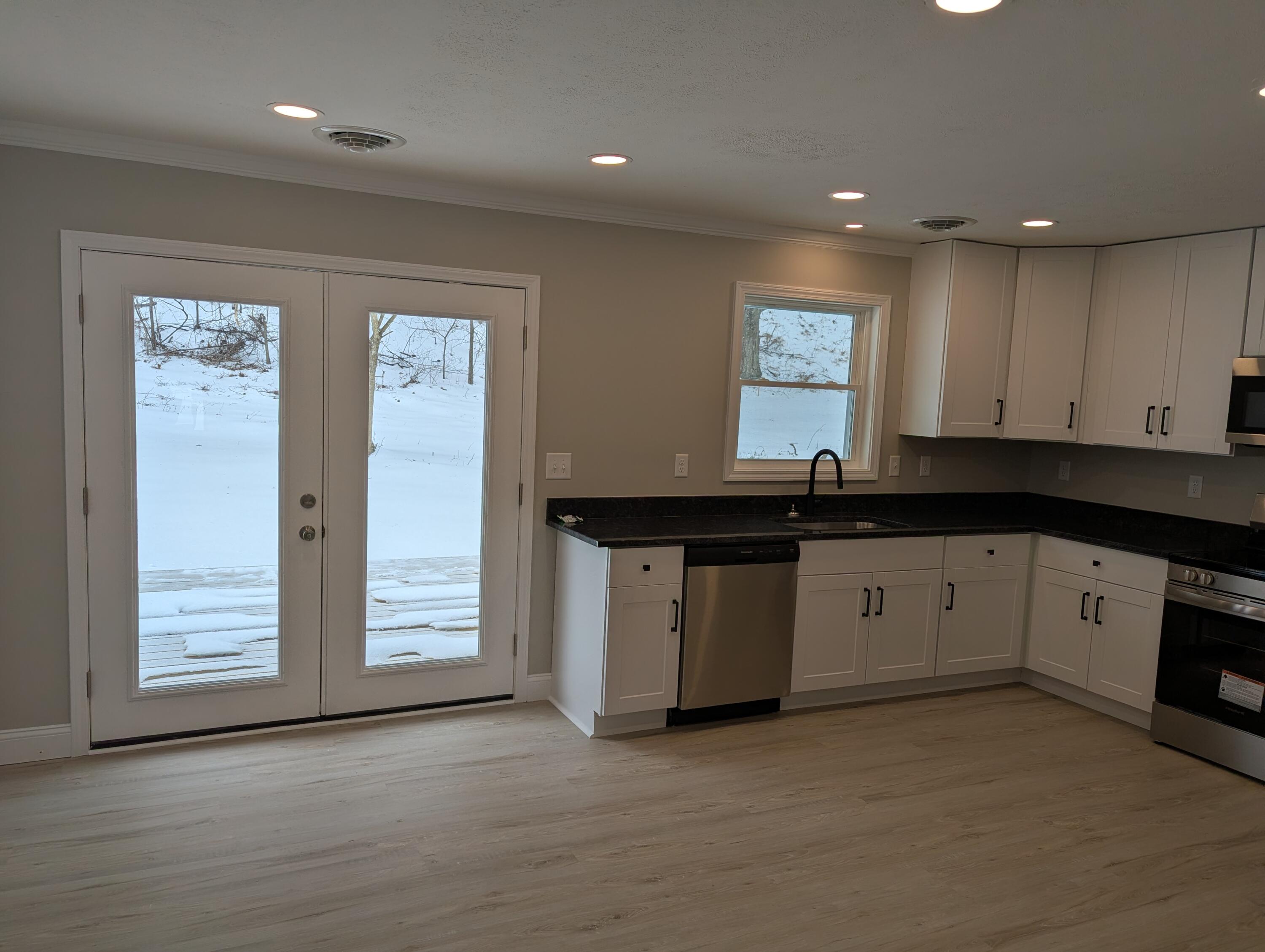 1020 Boones Mill Road Boones Mill, VA 24065 - Photo 11 of 38 Dining area leading to deck